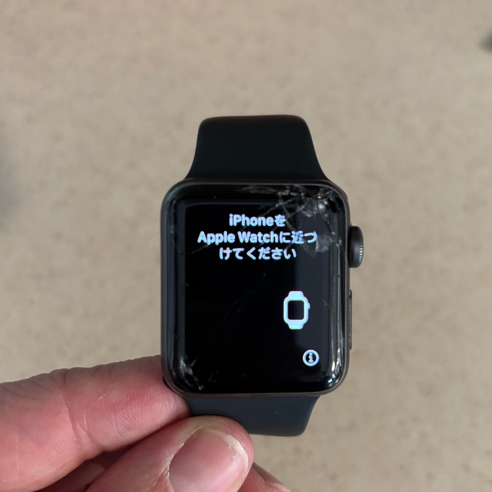 Apple Watch with Black Sport Band and Cracked Screen